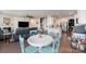 Open-concept living space featuring a modern kitchen, dining area, and inviting living room with fireplace at 1051 Lookout Shoals Dr, Fort Mill, SC 29715