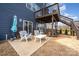 Charming patio with comfortable seating beneath a cozy upper deck offers relaxation and shade at 1051 Lookout Shoals Dr, Fort Mill, SC 29715
