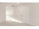 Bedroom featuring neutral carpet, white door and white trim at 111 Noah Ln, Troutman, NC 28166