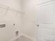 Utility room with basic features like wire shelving, electrical outlets, and plumbing hookups for appliances at 111 Noah Ln, Troutman, NC 28166