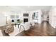 Inviting living room with a fireplace, modern decor, and hardwood flooring at 115 Noah Ln, Troutman, NC 28166