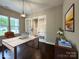 Bright home office with French doors, wood floors, modern lighting and a neutral color palette at 157 Powder Spring Dr, Statesville, NC 28677