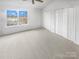 Spacious bedroom with large window and neutral carpet at 16837 Greenlawn Hills Ct, Charlotte, NC 28213