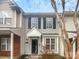 Charming townhouse featuring gray siding, black shutters, and a welcoming entrance at 16837 Greenlawn Hills Ct, Charlotte, NC 28213
