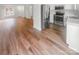 View of the kitchen with stainless steel appliances and wood flooring at 16837 Greenlawn Hills Ct, Charlotte, NC 28213