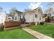 Backyard of a home with a raised deck and yard at 239 Euclid Ave, Statesville, NC 28677