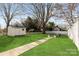 Spacious backyard featuring a shed, a walkway, green grass, and outdoor seating at 239 Euclid Ave, Statesville, NC 28677
