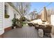 Spacious backyard deck with outdoor furniture and a peaceful setting, ideal for entertaining and relaxation at 239 Euclid Ave, Statesville, NC 28677