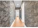 Hallway with unique wallpaper and lighting, leading to various rooms in the home at 239 Euclid Ave, Statesville, NC 28677