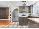 Well-appointed kitchen with stainless steel appliances, center island, and neutral cabinets, designed for both cooking and entertaining at 239 Euclid Ave, Statesville, NC 28677