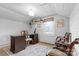 Charming home office with vintage accents, natural light, and comfortable seating at 239 Euclid Ave, Statesville, NC 28677