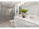 Modern bathroom with a glass-enclosed shower, double vanity, and stylish fixtures at 265 Red Fox Ln # 1P, China Grove, NC 28023
