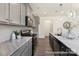 Modern kitchen features stainless steel appliances, granite countertops, and stylish lighting at 265 Red Fox Ln # 1P, China Grove, NC 28023
