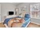 Bedroom featuring a plush bed, television and natural light at 304 Keller St, China Grove, NC 28023