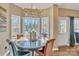 Cozy breakfast nook with modern lighting and large windows at 304 Keller St, China Grove, NC 28023
