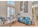 Bright and airy living room with soaring ceilings, stylish decor, and hardwood flooring at 304 Keller St, China Grove, NC 28023
