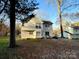 Lush backyard with a patio area, ideal for outdoor dining and relaxing at 312 Radio Rd, Charlotte, NC 28216