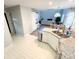 Kitchen sink area featuring granite countertops and a view of the living room at 312 Radio Rd, Charlotte, NC 28216