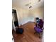 Bedroom featuring hardwood flooring, closet, and overhead lighting at 3527 Crestridge Dr, Charlotte, NC 28217