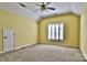 Spacious bedroom features vaulted ceilings, carpet flooring, and a ceiling fan at 3620 Cole Mill Rd, Charlotte, NC 28270