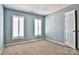 Bedroom features two windows with plantation shutters and carpet flooring at 3620 Cole Mill Rd, Charlotte, NC 28270
