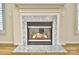 Close up of a fireplace with marble surround and hearth at 3620 Cole Mill Rd, Charlotte, NC 28270