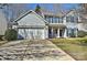 Charming two-story home featuring blue shutters and a two car garage, surrounded by well-maintained lawns at 3620 Cole Mill Rd, Charlotte, NC 28270