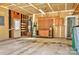 Unfinished garage space, including a water heater at 3620 Cole Mill Rd, Charlotte, NC 28270