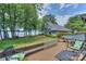 Backyard overlooking a bridge leading to the lake, and a well furnished deck at 405 Northwest Dr, Davidson, NC 28036