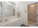 Well-lit bathroom features a dual sink vanity and a walk-in shower at 405 Northwest Dr, Davidson, NC 28036