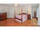 Comfortable primary bedroom offers hardwood floors and ample closet space at 405 Northwest Dr, Davidson, NC 28036