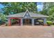 Spacious garage/carport with ample parking, unique design, and convenient access at 405 Northwest Dr, Davidson, NC 28036