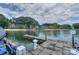 Dockside view of luxury residences along the waterfront with sandy beach at 405 Northwest Dr, Davidson, NC 28036