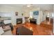 Relaxing living room with fireplace, piano, and media, perfect for Gathering gatherings at 405 Northwest Dr, Davidson, NC 28036