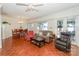 Open-concept living and dining area featuring lake views through sliding glass doors at 405 Northwest Dr, Davidson, NC 28036
