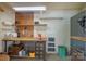 Well-organized workshop with workbench, pegboard, shelves, and ample storage space at 405 Northwest Dr, Davidson, NC 28036
