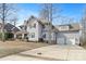 Charming two-story home featuring a spacious driveway and attached two-car garage at 4915 Ardenwoods Dr, Charlotte, NC 28215