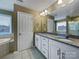 This bathroom features double sinks and a large vanity mirror at 509 Riviera Pl, Rock Hill, SC 29730