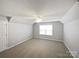 This bedroom features neutral gray walls and a ceiling fan at 509 Riviera Pl, Rock Hill, SC 29730