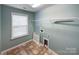 This laundry room features built in shelving and tan tile floors at 509 Riviera Pl, Rock Hill, SC 29730