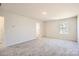 Neutral bedroom featuring plush carpet, natural light, and ample closet space at 5336 Small St, Catawba, NC 28609