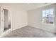 Well-lit bedroom featuring plush carpet, a large window, and ample closet space at 5336 Small St, Catawba, NC 28609