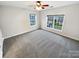 Spacious bedroom featuring neutral paint, plush carpeting and natural light at 6409 Chadwell Ct, Fort Mill, SC 29707