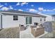 Backyard patio with outdoor furniture, sliding door, and grill at 730 Bonica Ct, Lancaster, SC 29720