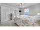 Bright bedroom with a floral bedspread, dresser, and ceiling fan at 730 Bonica Ct, Lancaster, SC 29720