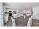 Open-concept dining room offering ample seating, stylish decor, and access to the kitchen and living area at 730 Bonica Ct, Lancaster, SC 29720