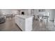 Spacious kitchen island with stylish countertop and seamless access to dining and living areas at 730 Bonica Ct, Lancaster, SC 29720