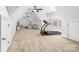 Spacious bonus room with neutral carpet and lots of natural light; perfect for flexible living at 7674 Bermuda Hills Ln, Denver, NC 28037