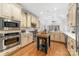 Well-appointed kitchen with stainless steel appliances and center island at 7674 Bermuda Hills Ln, Denver, NC 28037