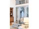 Living room with hardwood floors, and an elegant staircase leading to the second floor of the home at 7674 Bermuda Hills Ln, Denver, NC 28037